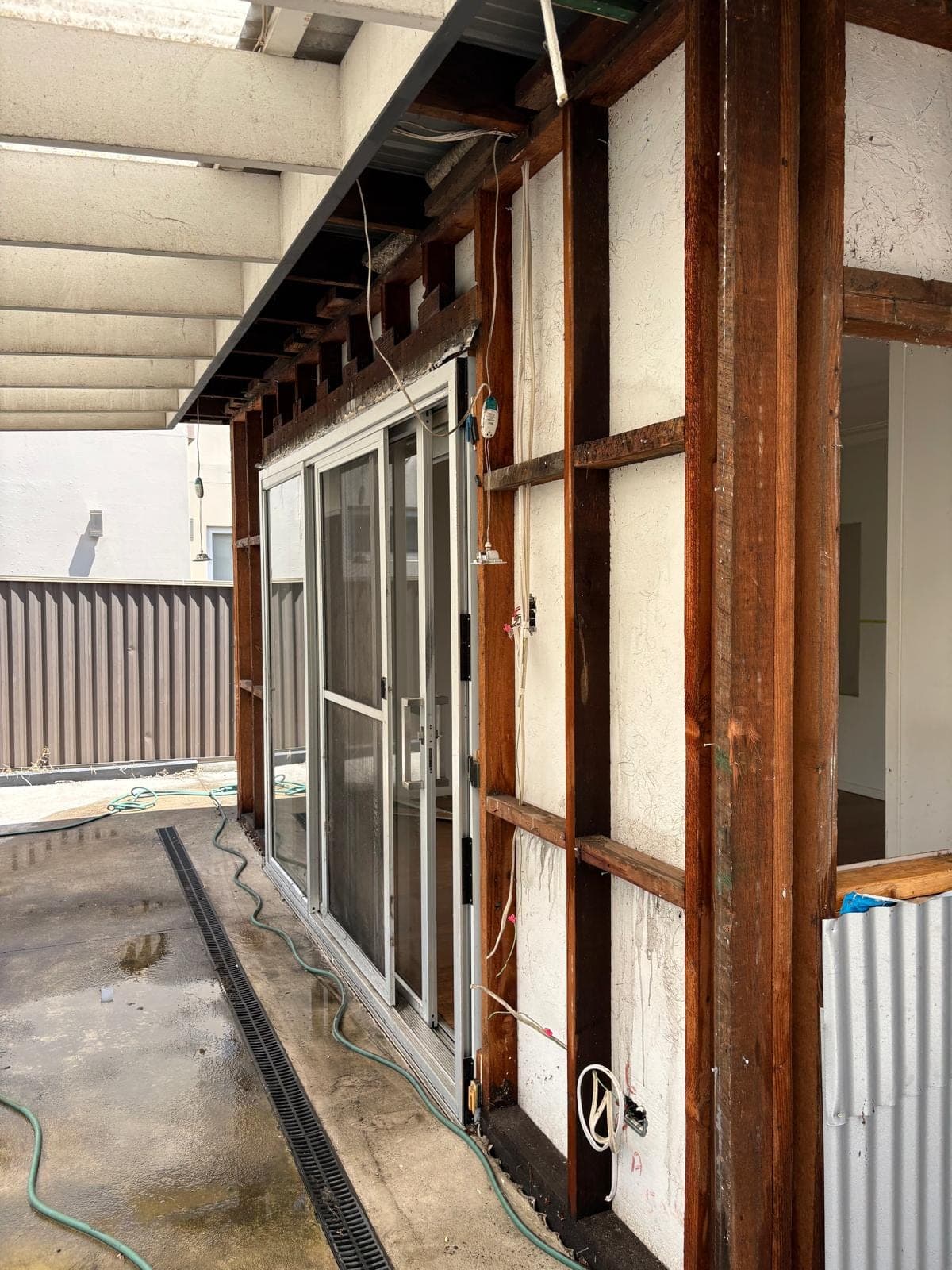 Exposed wall framing during the strip-out
